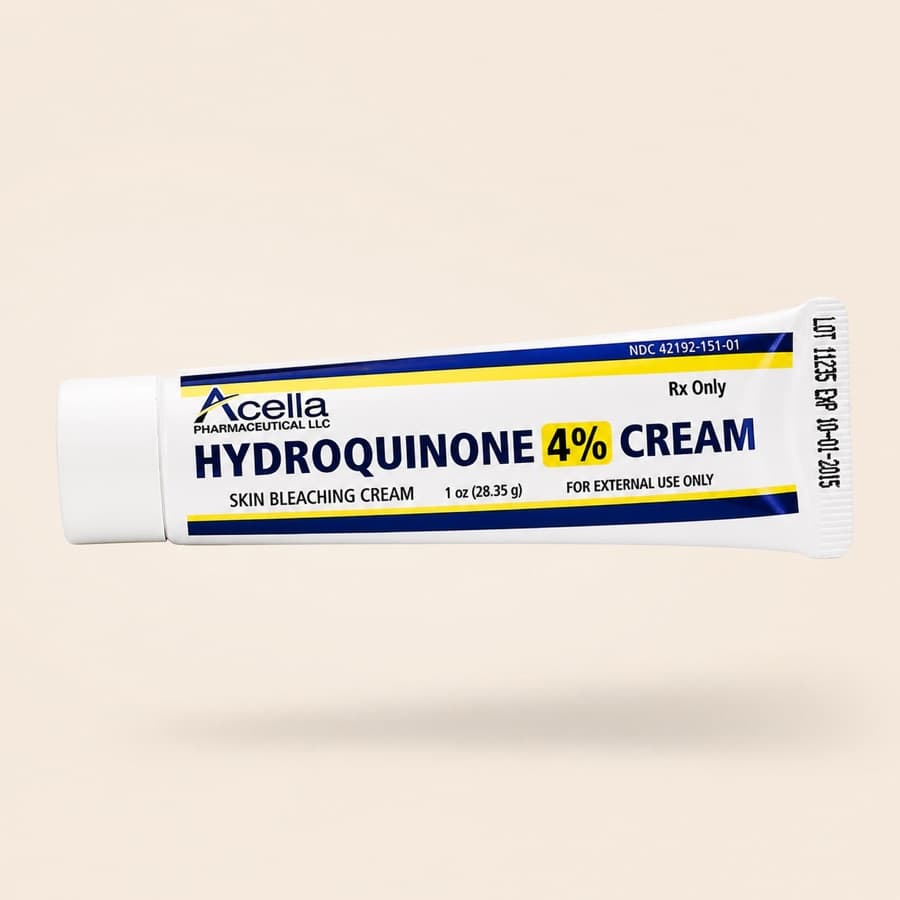 Hydroquinone 4% prescription cream tube floating against a warm greige background