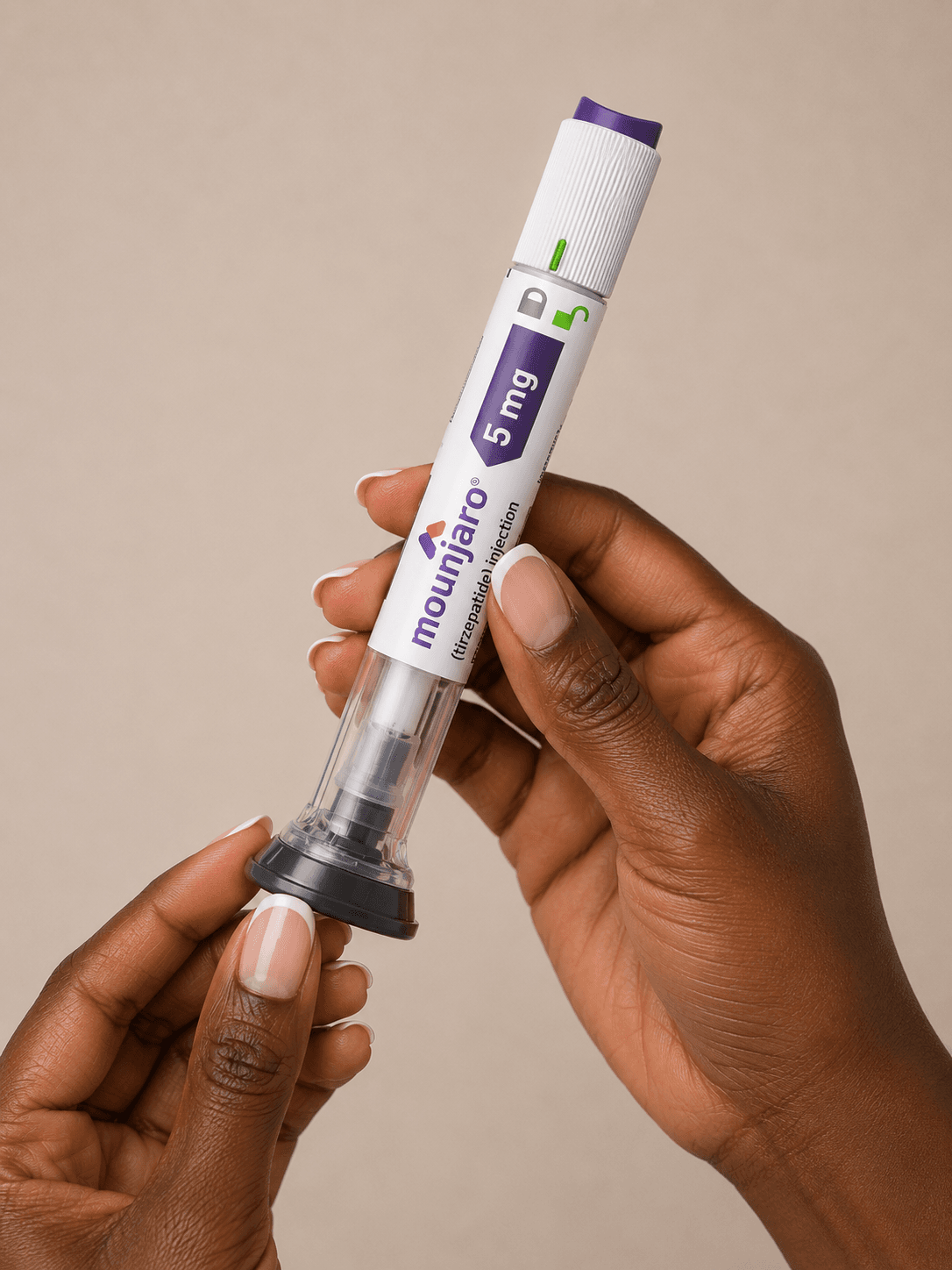Two hands holding a Mounjaro 5 mg injection pen against a warm beige background